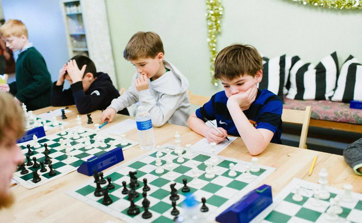 Beginner students playing at offline chess coaching in Mumbai center